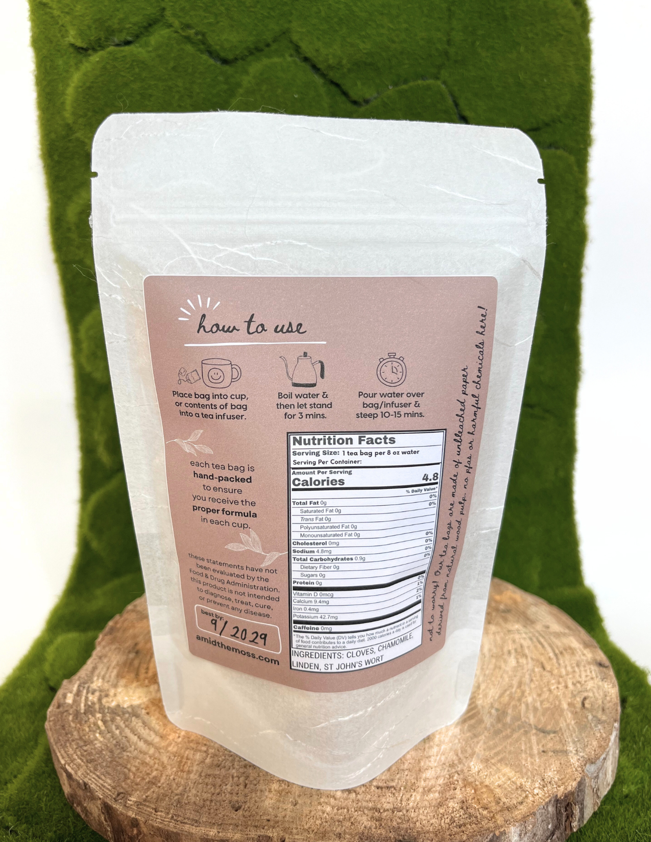 White packaging with a label on a green textured background